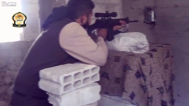LiveLeak - Cam records a terrorist sniper shot and one lucky Syrian soldier lives to see another day