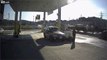 LiveLeak - Car crashes and slides on its side through gas station