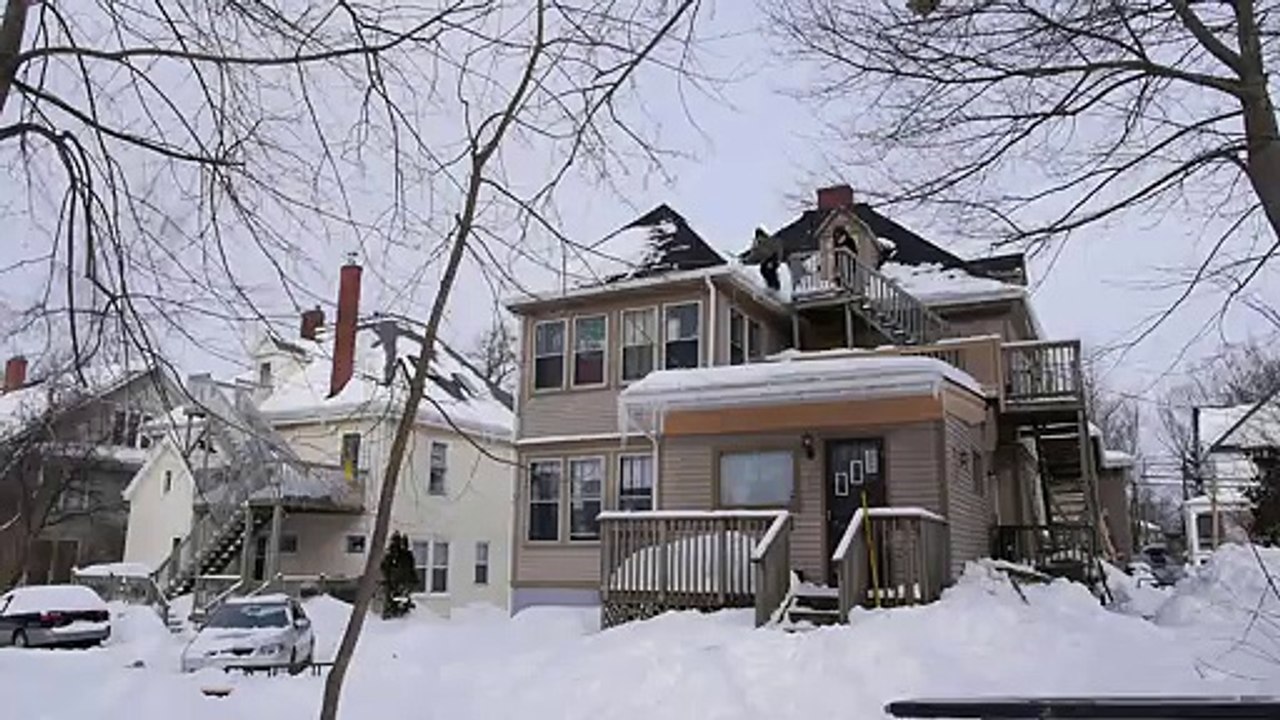 Snowboarding off the roof!