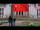 Communist flag waving: Tea partiers get help from state trooper to tear down Chinese flag