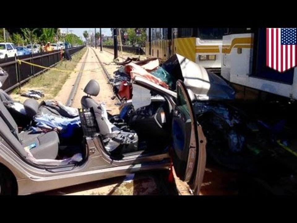 LA train crash: Car utterly destroyed by collision near Los Angeles USC campus which injures 21