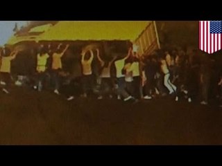 Des passants héros sont filmés secourir un homme sous un camion