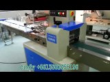 Automatic flow packaging machine with auto punching device