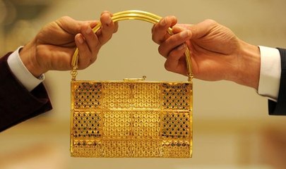 Lüks araba fiyatına altın çanta