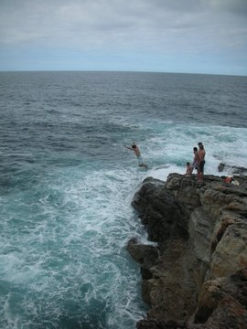 Daredevil Cliff-Jumper Escapes From Dangerous Waves