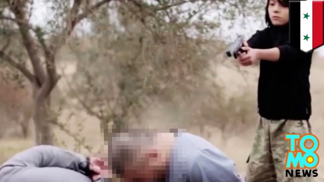 فيديو لداعش يظهر فيه طفل يعدم روسيان عملاء للمخابرات الروسية