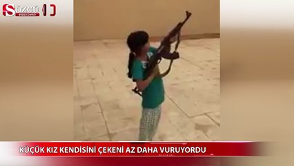 Küçük kız kendisini çekeni az daha vuruyordu