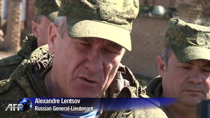 Village in east Ukraine hit by shelling despite ceasefire