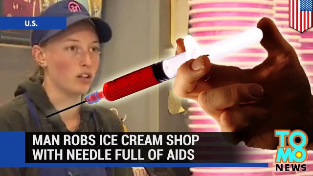 رجل يسرق محل لبيع البوظة مهدداً بإبرة مليئة بفيروس الايدز