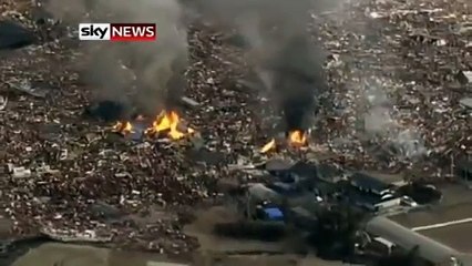 Most Unbelievable footage of Japanese Tsunami I have seen so far (taken from helicopter)