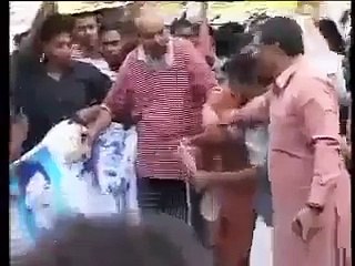 MQM Worker against Altaf Hussain during a Protest