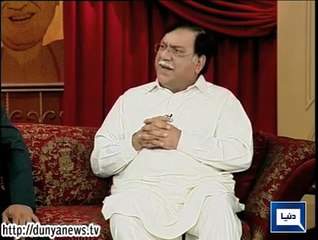 Azizi plays Pervaiz Rasheed with a PTI worker from Karachi