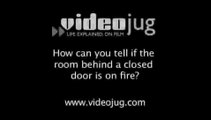 How can you tell if the room behind a closed door is on fire?: In The Event Of A Fire