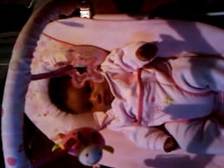 2 month old baby watching Planets Funniest Animals