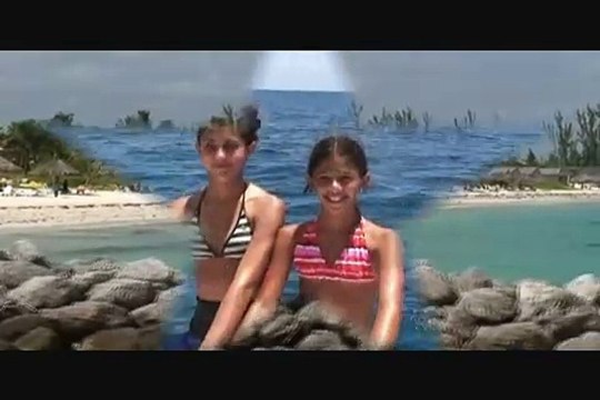 Teenagers diving with sharks in The Bahamas