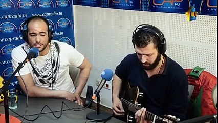فهمي الرياحي و غسان بن الحاج عمر  راكب على الحمراء