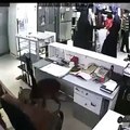Small child robbing  shop with his family