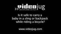 Is it safe to carry a baby in a sling or backpack while riding a bicycle?: Carrying Children On Bicycles