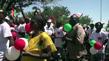 Burundi government supporters show unity in face of divisions