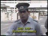 DDR-Grenztruppen-Oberst wird 1987 am Berliner Checkpoint Charlie von ehem. Flüchtlingen gereizt.