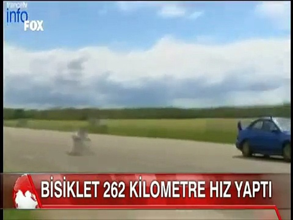 Yarış otomobilini 262 Kilometre hız yaparak geçen Süper Bisiklet