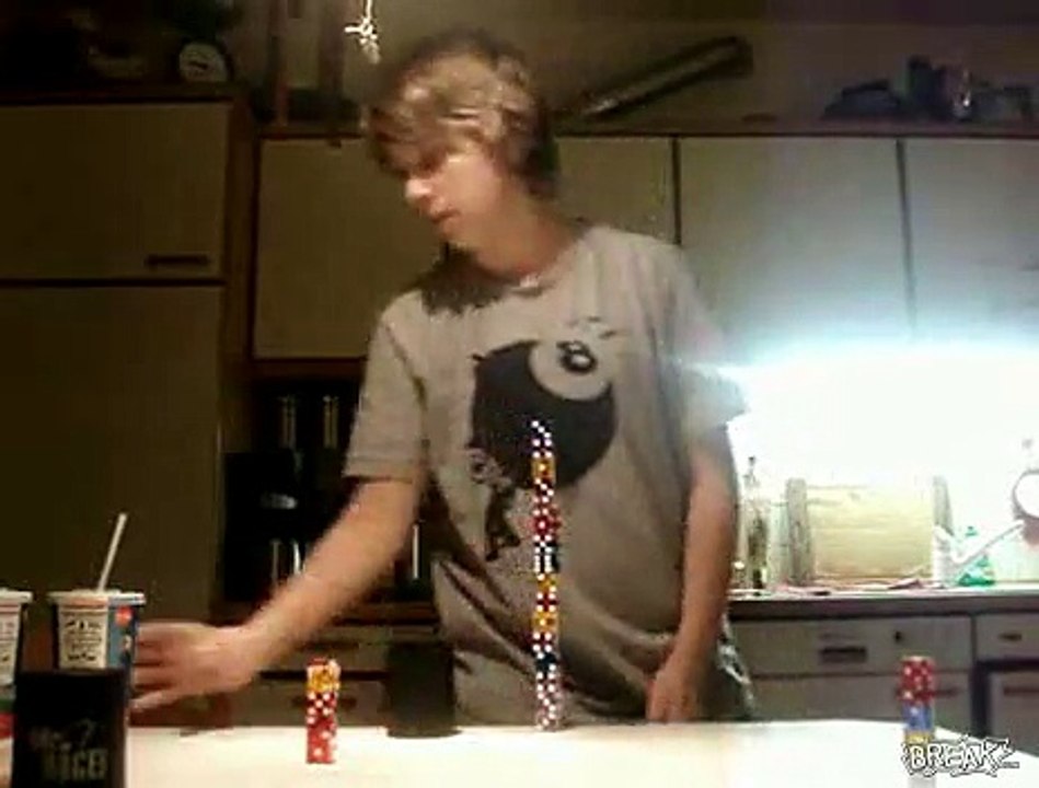 Guy Stacks 14 Pairs Of Dice