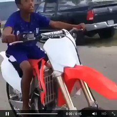 crazy teen ridding a motobike.