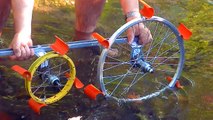 Take free kinetic energy from river stream with two paddle wheels in line of a stream