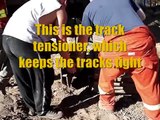 Installing track tensioners and idlers on a 330 Zaxis
