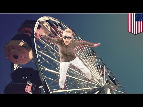 Estúpido adolescente cae de una rueda de la fortuna por ponerse de pie en su asiento