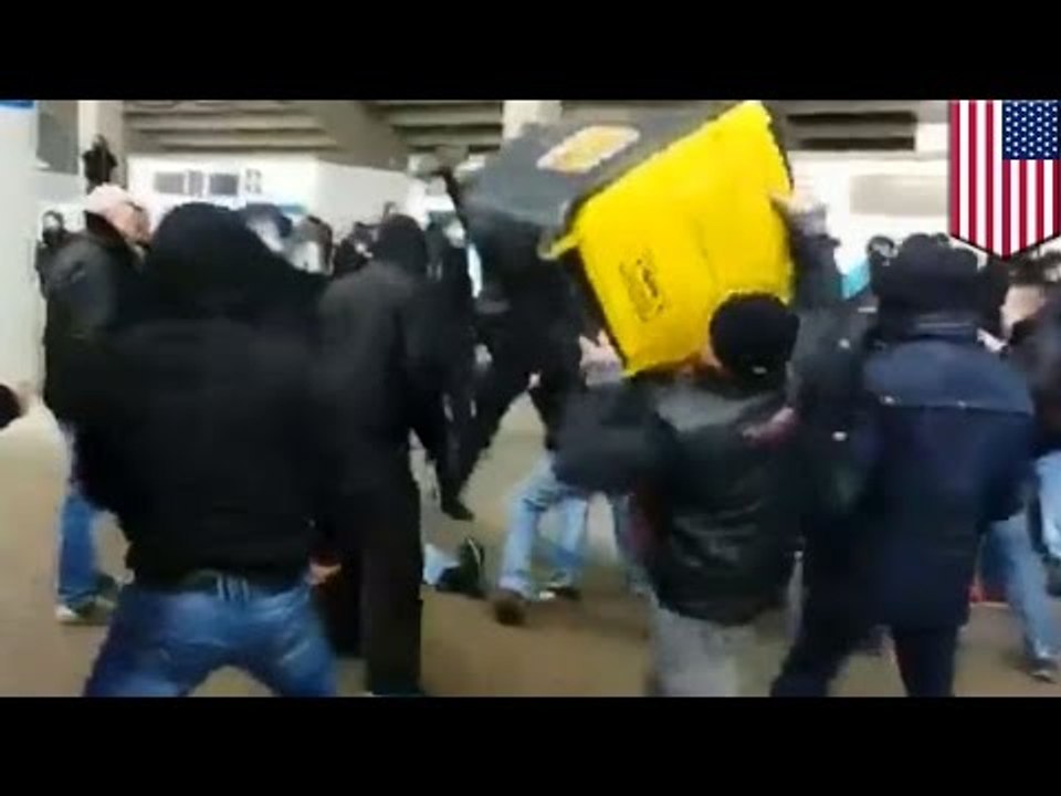 Idiot football hooligan: German soccer fan hits friend instead of riot cop during street fight