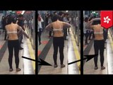 Shirt off in public: woman strips topless and changes in HK subway