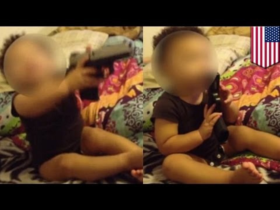 Gun-wielding baby caught on camera: worst parents ever film toddler playing with .40-caliber gun
