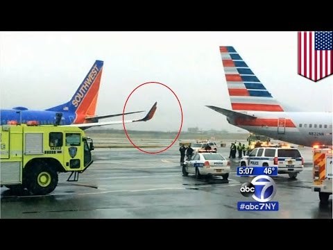 La Guardia fender bender: Two jets smash into each other while taxiing at New York airport