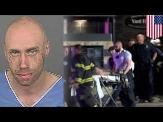 Bum caught in restaurant wall makes cops use chainsaw to get him out!