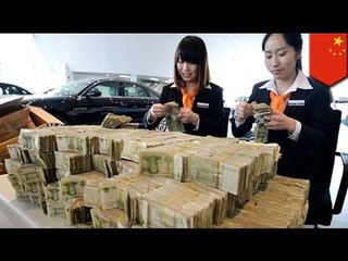 Chinese na lalaki, bumili ng kotse sa pamamagitan ng 120,000 na One-Yuan bills!
