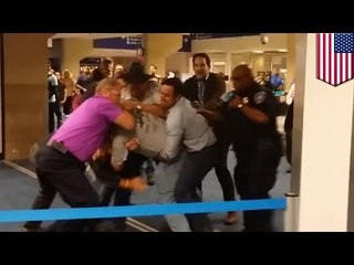 Racist homophobe attacks man for wearing pink shirt, gets taken down at Dallas airport