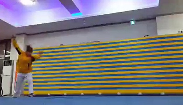 Martial arts tricks by a lady