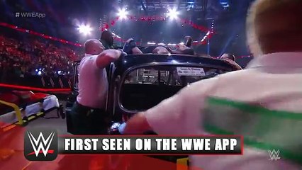 Roman Reigns is attended to by medical personnel FIRST SEEN ON THE WWE APP, April 13, 2015