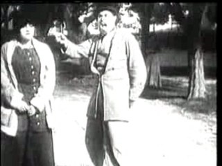 Charlie Chaplin - Between Showers (1914)