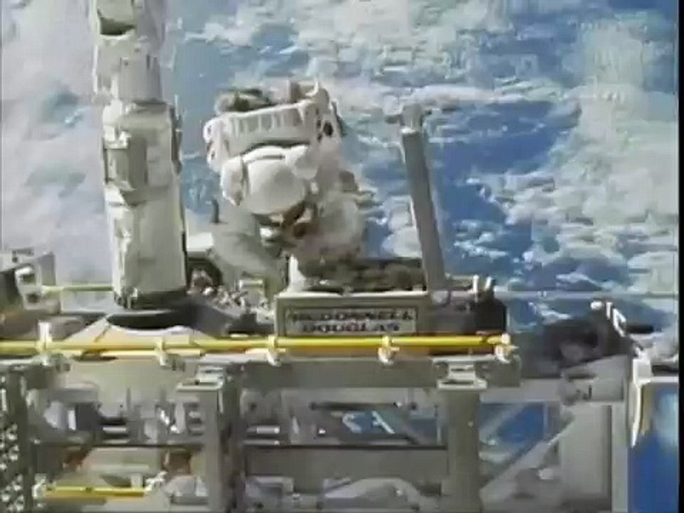 Donning the Shuttle EMU space suit