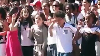 Francophone elementary school students sing classic American Pop Songs, Paris France