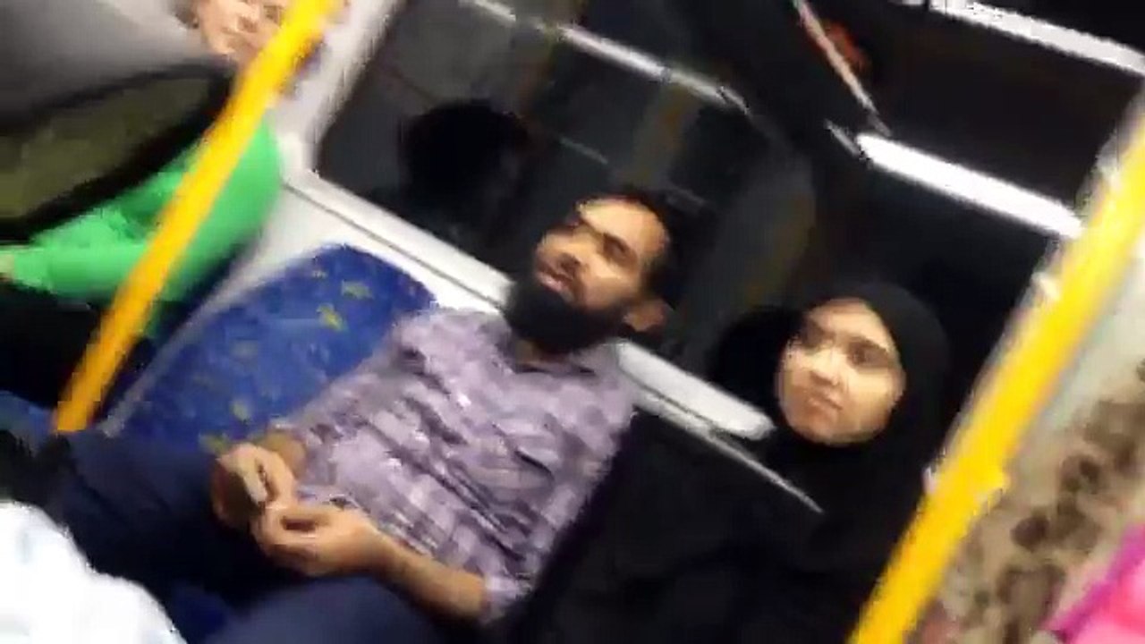 Woman defends muslim couple after listening to racist rant on train.mp4