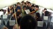 Philadelphia Orchestra musicians perform on flight waiting on Beijing tarmac.