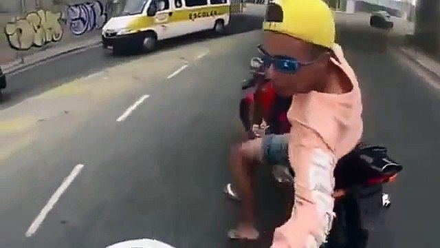 Helmet-cam captures moment thief steals Brazilian man's motorbike - and is immediately shot by undercover police