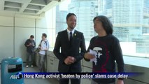 Hong Kong protester 'beaten by police' slams case delay