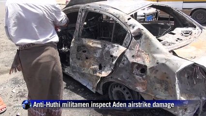 Anti-Huthi militamen inspect airstrike damage in Aden