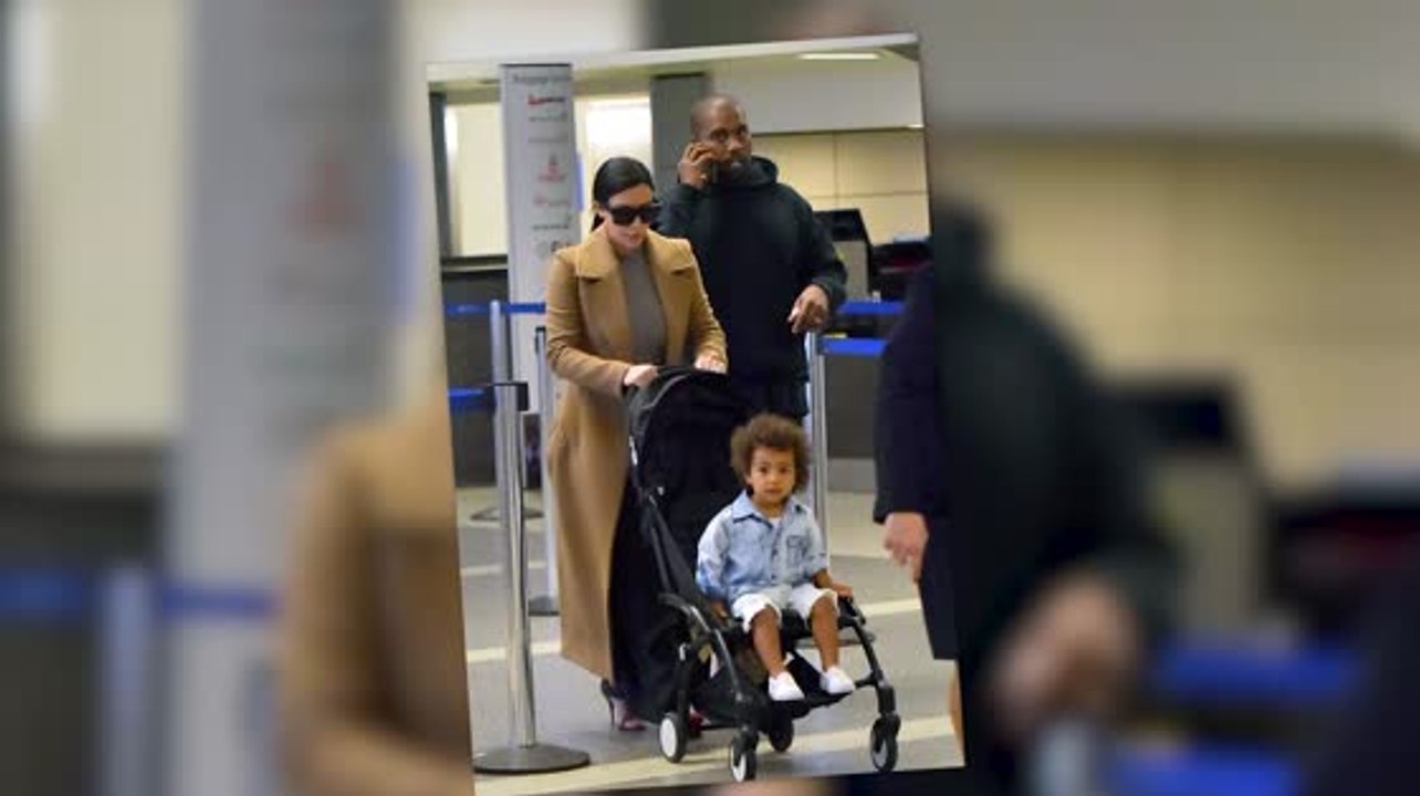 Influential Couple Kim Kardashian And Kanye West Arrive At LAX