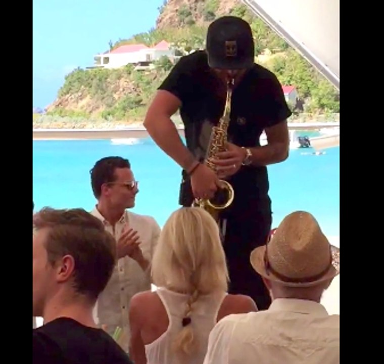 Saxophonist's Beat Delights Crowds Enjoying the Caribbean Sunshine