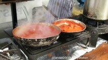 London Street Food. Cooking a Perfect Italian Pasta With Red Pesto. Exmouth Market